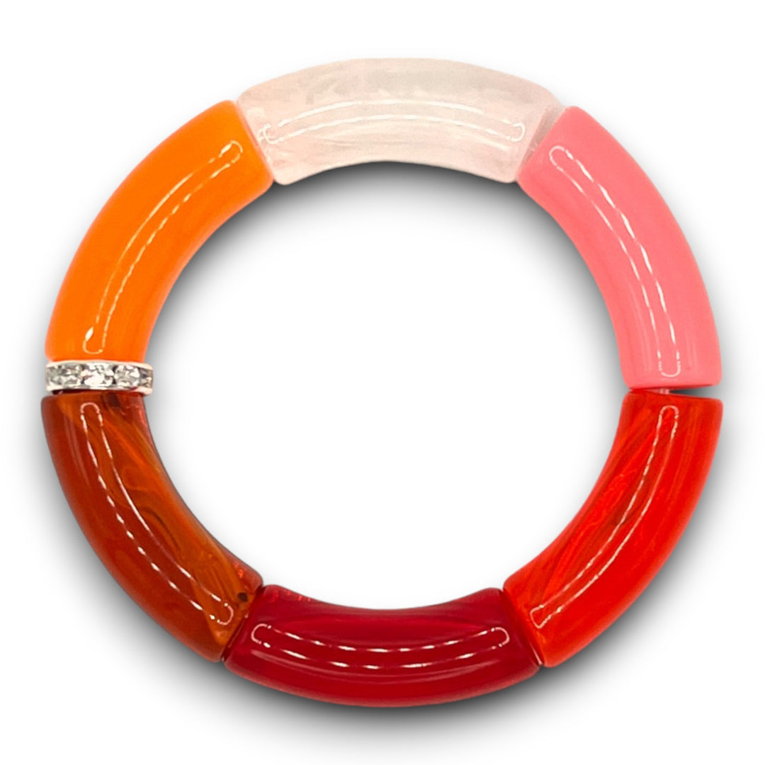Pink and orange beaded resin stretch bracelet with a diamond rhinestone rondel. 