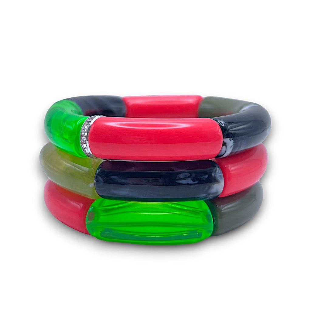 Three hot pink, green, and black beaded resin stretch bracelets with a diamond rhinestone roundel. 