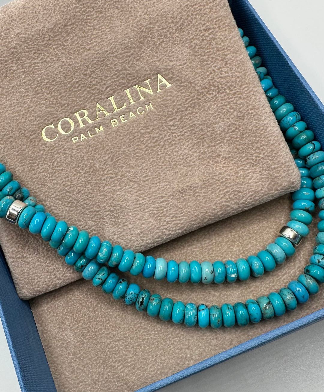 Two genuine AAA grade natural Arizona turquoise beaded necklaces placed in a custom Italian Coralina Palm Beach box. 