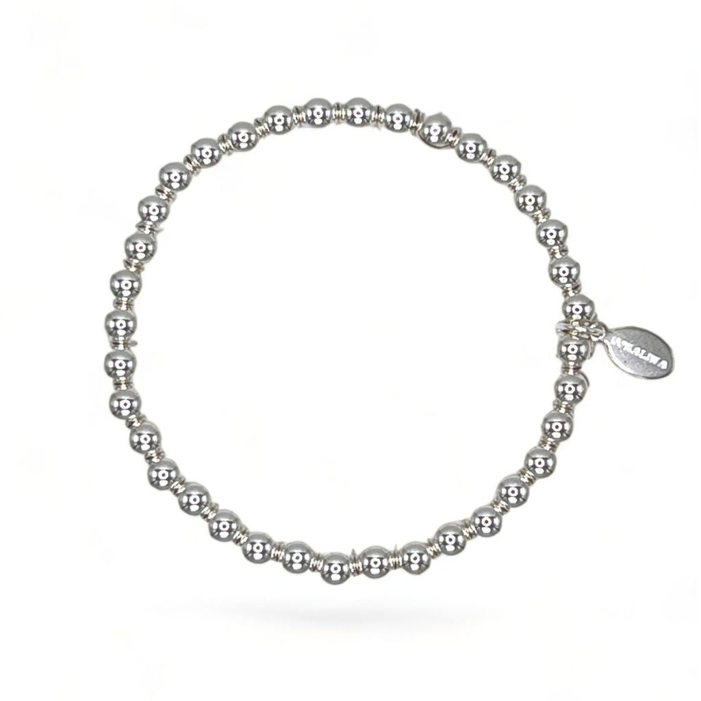 Sterling Silver Beaded stretch Bracelet (5mm) with custom Coralina logo tag.