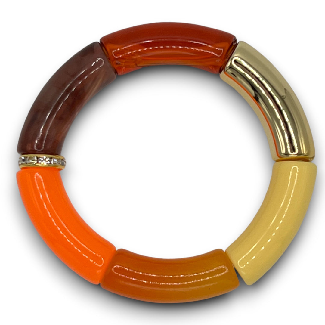 Orange, yellow and amber beaded resin bracelet with a diamond roundel. 