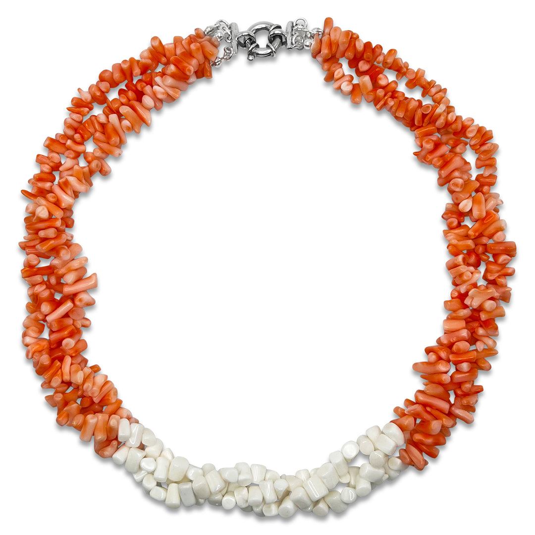 Triple strand of pastel pink/peach and bright white coral fades into each other as they are strung and spun into a beautiful necklace and finished with sterling silver. 
