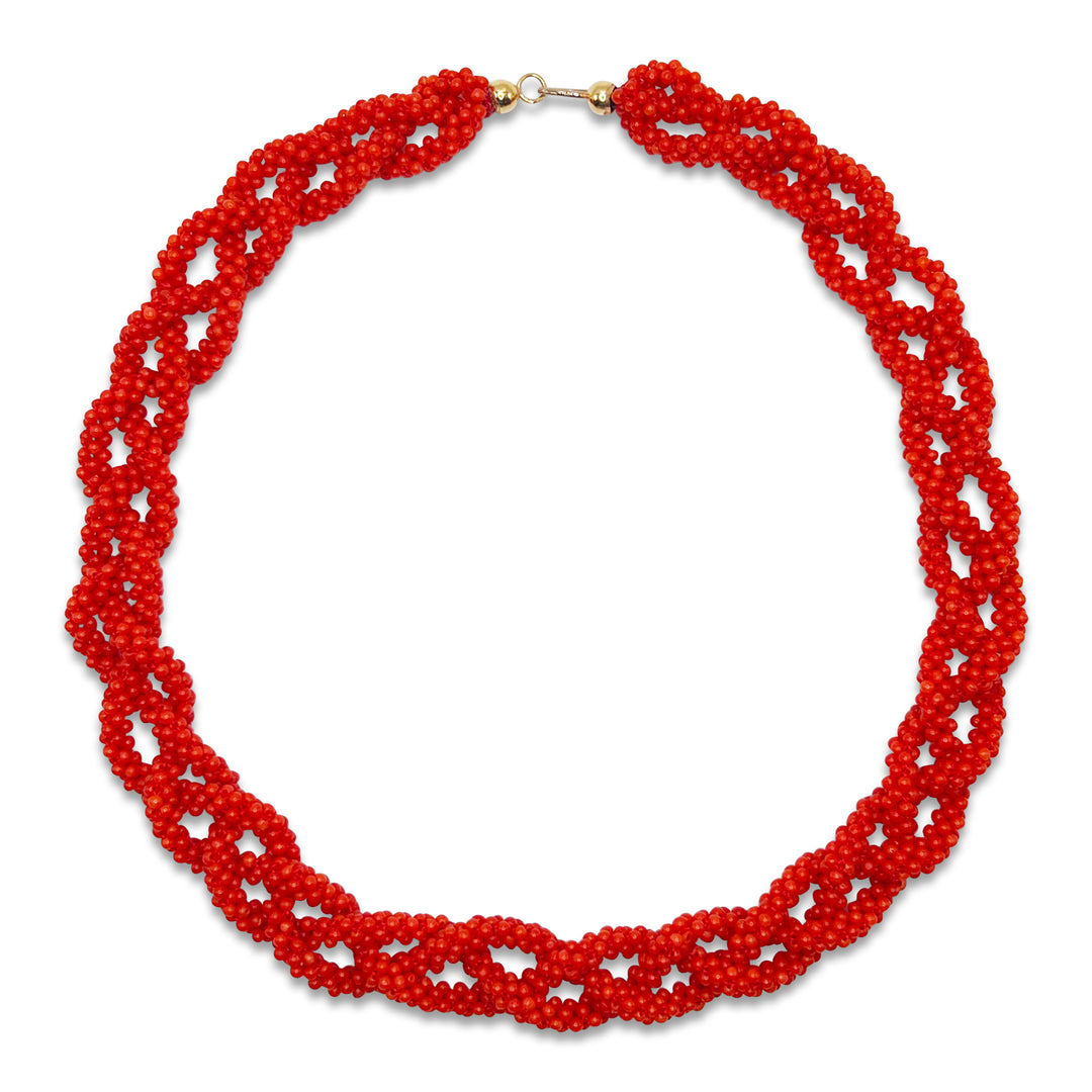 Red Mediterranean coral necklace delicately woven and then braided into a necklace designed to captivate with its bold color and elegant design.