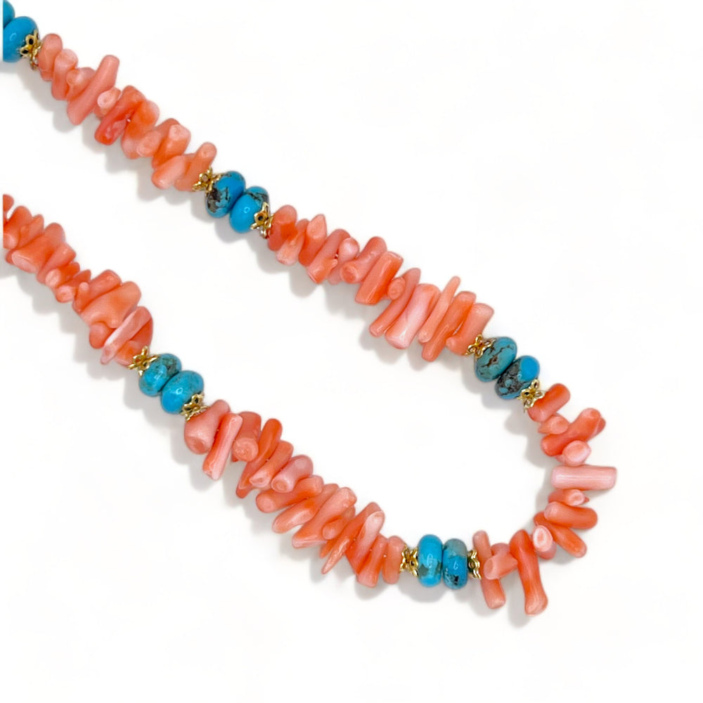 Pink/orange coral necklace with natural Arizona bright blue turquoise and gold accents. 