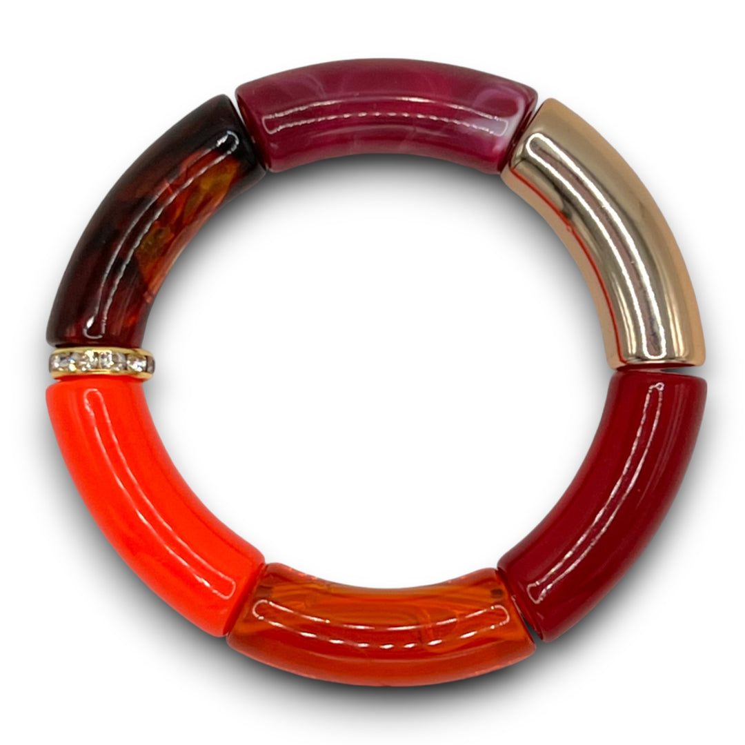 Amber, merlot, gold and bright red beaded resin bracelet with a diamond rhinestone roundel. 