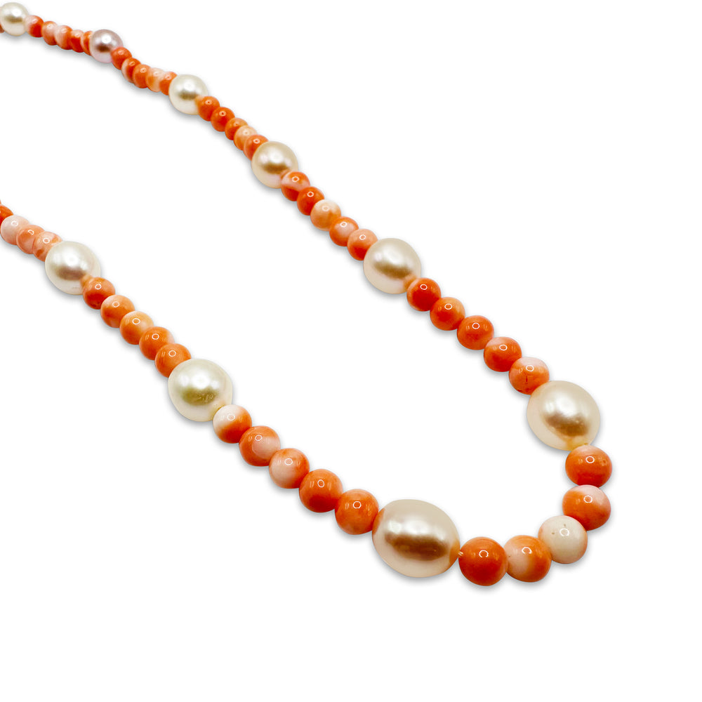Natural and Sustainable South Pacific Pink Coral and Pearl Necklace Finished with a Sterling Silver Clasp. Made in Italy.
